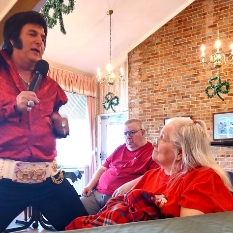 elvis serenades one of our residents
